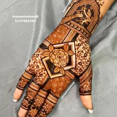 A full view of the rose-centric design. The combination of the central flower, the birds in the jharokha, and the surrounding patterns creates a unique and elegant look.