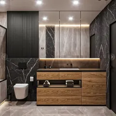 A sleek and moody bathroom with black marble walls and a floating wooden vanity. The backlit mirror and under-vanity lighting create a sophisticated, high-end hotel vibe.