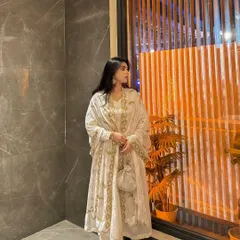 Another angle of the white ethnic outfit, highlighting the delicate details on the dupatta.