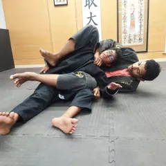 In our kids' BJJ program, we teach practical techniques like controlling an opponent from the mount. It's a safe and structured way for children to learn body awareness and self-defense.