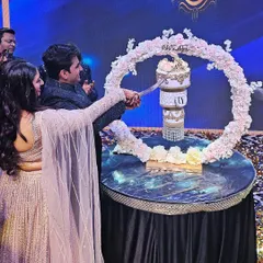 A beautiful moment of the couple cutting their chandelier engagement cake. I love seeing my creations become part of such happy memories.