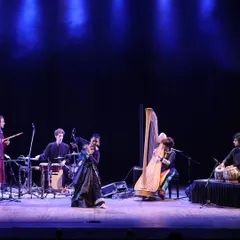 A beautiful moment from the 'Jazz meets Kathak' concert at the Royal Opera House, Mumbai. Here, I am accompanying international artists on the harp and woodwinds, creating a unique fusion of world music, jazz, and Indian classical rhythm.