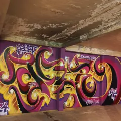 This is my Masala Flow. I mix classic graffiti with Indian flavor, using Hindi letters to create something new. This piece, done in Malaysia, shows how I bring my roots to walls across the world.