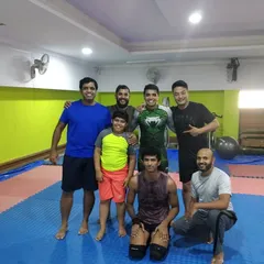 The team with guest coach Sharmaji from BJJ Trivandrum. We're grateful for visitors who share their expertise and enrich our community.