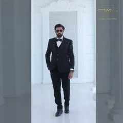 For the groom who appreciates classic style. This sharp black tuxedo is a timeless choice for a reception or cocktail event. It's a perfect example of the premium groom's wear you can find in my collection, available for sale at an amazing price.
