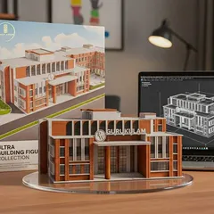 To help clients truly understand the architectural vision, we create detailed physical models like this one for the 'Gurukulam' school. It provides a tangible representation of the building's structure and facade, bridging the gap between a digital render and the final product.