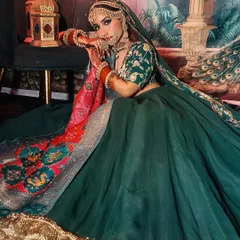 This full-length shot captures the grandeur of the entire ensemble. My job is to ensure the makeup and hair work in perfect harmony with such a statement outfit.