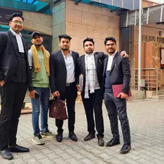 With my colleagues outside the court's filing centre. A lot of the work happens outside the courtroom, discussing strategies and preparing for the next steps. Teamwork is essential.
