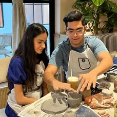 Two siblings work together on their hand-building projects. These sessions are a great way for kids to unwind, focus, and create something soulful with their own hands.