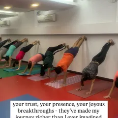 Your trust, your presence, your joyous breakthroughs. They've made my journey richer than I ever imagined. This is a moment from an in-person class, where students are supporting each other in wall-assisted handstands.