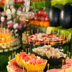 A feast for the eyes and a treat for the taste buds. My exquisite fruit displays feature artfully arranged watermelon, lychee, and dragon fruit, keeping guests refreshed and delighted.