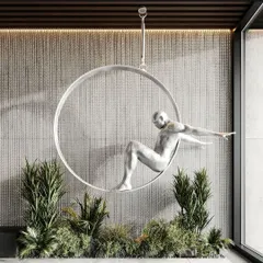 Art meets nature in this unique installation. We integrated a modern sculpture within a bed of lush faux greenery, creating a botanical canvas that is both a garden and an art piece.