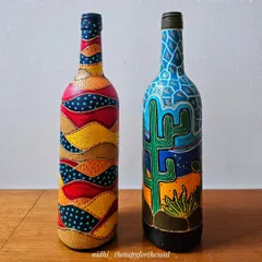 I love experimenting with themes, and this set is inspired by desert and island landscapes. One bottle features abstract, layered patterns like desert hills, while the other shows a cactus scene against a starry night.