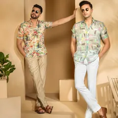 Another composition from the men's fashion shoot, showcasing the versatility of the collection. The models' confident poses against the minimalist set create a clean, modern aesthetic.