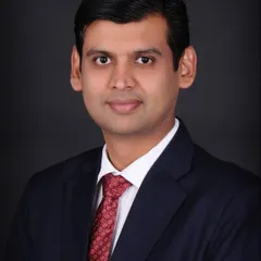 For a more formal and serious tone, I use a solid black backdrop. This style of business portrait photography adds a sense of authority and is excellent for executive bios, author photos, or any professional who wants a powerful image.
