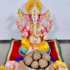 Get ready for Ganpati by ordering your favorite laddoos from our kitchen. Here is a bowl of our homemade Churma Ladoos offered to Ganpati Bappa.