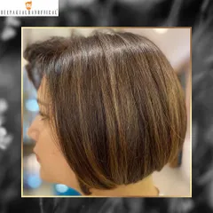 Another angle of this chic bob with spun gold highlights. This style is timeless and easy to maintain with the right hair care regimen.