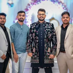 The groom-to-be with his crew at the engagement party. A great shot of the guys looking happy and ready to celebrate.