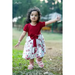 Taking her first steps into a new year. This full-length shot of Riona shows her in motion, capturing the energy and spirit of a two-year-old during her outdoor birthday session.