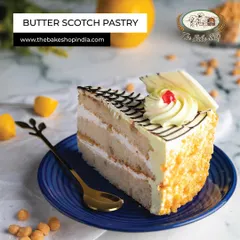 A classic Butter Scotch Pastry, with layers of light sponge, creamy frosting, and crunchy butterscotch bits.