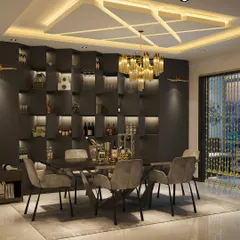 A well-designed dining room can elevate your mood. This space uses dramatic, built-in shelving with custom lighting to create a sophisticated and intimate ambiance, perfect for hosting memorable dinners.