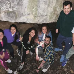 The tribe gathered together during a cave exploration on one of our treks. We mix adventure with moments of quiet connection, creating memories that last a lifetime.