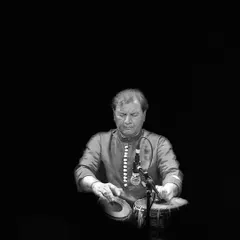 Another moment from the Hoxton concert. Here, my hands are in the midst of playing a complex rhythmic pattern, a hallmark of the Ajrada style of tabla playing.