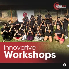 A group photo from one of our innovative workshops held outdoors. We take training beyond the four walls of the gym to create memorable and effective learning experiences.