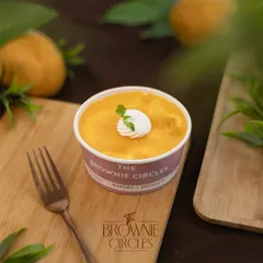 Have you tried our Mango-misu yet? It's a tropical twist on the classic tiramisu, with luscious layers of mango puree, vanilla cake, and cream.