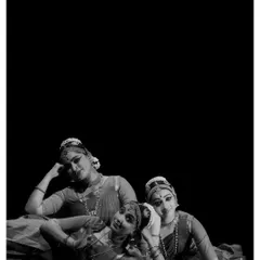 A moment of rest and camaraderie on stage with fellow dancers from the Chithkala Ensemble during 'Nritya Lahari.'