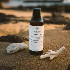 Meet Hairlixer, our leave-in hair serum. It’s a powerhouse blend of natural silicone alternatives, seabuckthorn, hemp, and argan oils to fight frizz, nourish, and add effortless shine.