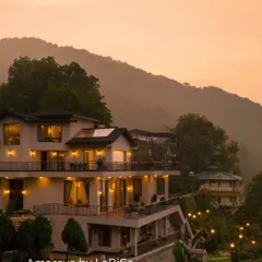 Amaraya by LaRiSa, a boutique hotel we designed in the Himalayas. The architecture uses minimal design and natural materials to blend into the mountainous landscape, offering a serene retreat with breathtaking views.