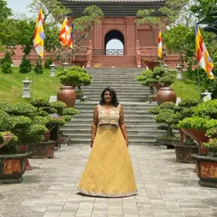 An Indian-inspired look in Vietnam. I wore this skirt and crop top to a beautiful temple. It's always fun to mix in a bit of your own culture when you travel.