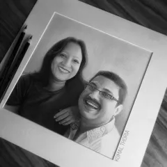 This 10x10 inch portrait was a special 25th-anniversary gift for a doctor couple from their hospital staff. The artwork is mounted with a classic white border, ready for framing.