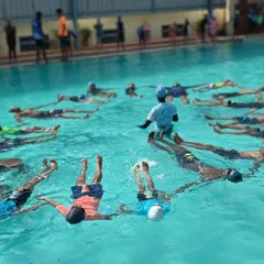 Participants practice a floating relaxation technique in our spacious pool. This form of yoga in water is an excellent way to practice mindfulness and achieve a state of tranquility.