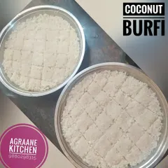 Two plates of fresh Coconut Burfi, cut into diamond shapes and ready for delivery. I use fresh coconut and cook it slowly to get that perfect soft and chewy texture.