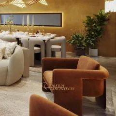 A close-up of the sculptural velvet armchair and unique dining chairs, showcasing how different forms and materials can create a cohesive and engaging living area.