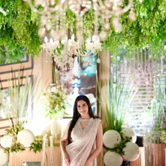 A beautiful shot under the chandelier at the golden anniversary event. The decor was as graceful and glamorous as the couple being celebrated.