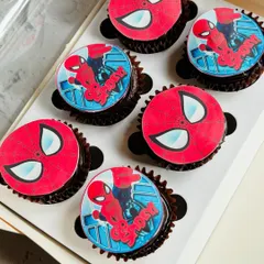 I designed these Spider-Man themed cupcakes for a little hero's birthday party. Each chocolate cupcake is topped with a high-quality, edible print of the iconic superhero, making them a guaranteed hit with the kids.