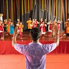 The view from my position as a choreographer. Leading a group of dedicated students is one of the most fulfilling parts of my work. It's about passing on the tradition and shaping a collective energy on stage.