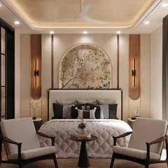 I believe a master bedroom should be a personal sanctuary. Here, a hand-painted arch mural serves as a stunning headboard, complemented by elegant wall sconces and a layered ceiling design to create a truly ambient and restful atmosphere.