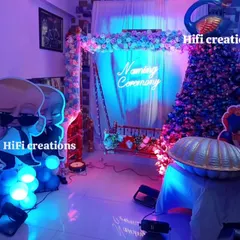 A modern "Boss Baby" themed naming ceremony. This unique setup includes a decorated cradle, character cutouts, and cool blue lighting for a fun and stylish event.