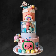 This grand three-tier Cocomelon cake was a joy to create for a special birthday. It features all the beloved characters, a rainbow, and personalized details, showing how I can handle large, intricate designs.