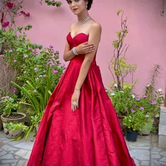 For a truly glamorous event, nothing beats a classic red ball gown. I crafted this piece with a sweetheart neckline and a full, flowing skirt that makes a grand entrance. It’s the kind of custom western gown that ensures you are the center of attention.