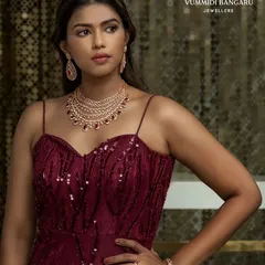 A glamorous evening look for a Vummidi Bangaru Jewellers campaign. We styled a gorgeous ruby and diamond necklace set with a deep red, sequined cocktail gown. This shows how we pair fine jewellery with western silhouettes for a modern, sophisticated feel.
