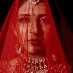 The bride's portrait is a story in itself. Through the traditional red veil, her eyes hold a universe of dreams and anticipation. I use dramatic lighting and composition to create timeless, artistic images that highlight the bride's strength and beauty.