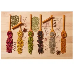 A detailed flat lay showcasing the natural ingredients of a tea blend. This type of ingredient photography helps communicate the quality and flavor profile of the product before the customer even tastes it.