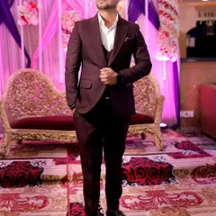A full suit look for a wedding reception. I am comfortable and experienced in formal event settings, ready to coordinate a sangeet or lead a dance segment for your guests.