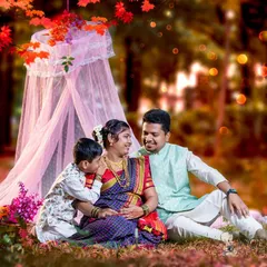 Including the whole family makes a maternity session extra special. Here, an older brother shares a secret with his soon-to-be sibling, creating a beautiful memory in a themed outdoor setup with traditional attire.
