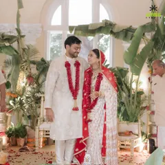 The couple shares a look of love during their simple and beautiful home wedding ceremony.